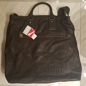 Puma brown travel bag with laptop support slot